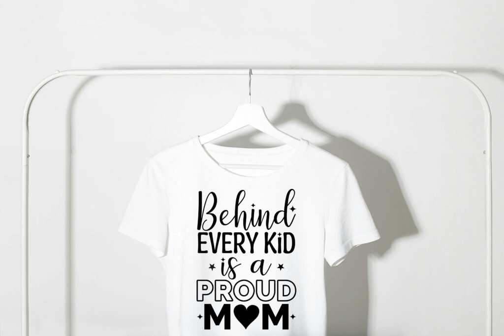 Behind Every Kid is a Proud Mom SVG design shown in elegant lettering, perfect for shirts, mugs, and DIY crafts - free instant download in SVG and PNG.