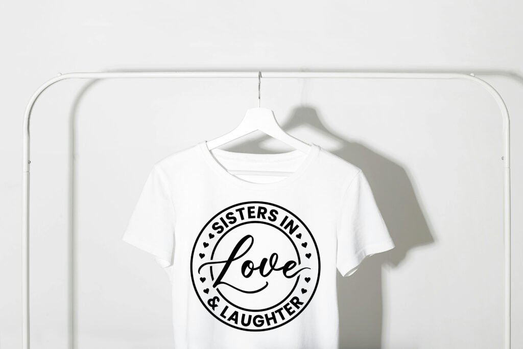 Sisters in Love and Laughter Free SVG Design for Cricut and Silhouette featuring a beautiful family quote that celebrates the joy and bond between sisters. Perfect for t-shirts, mugs, and gift crafts.
