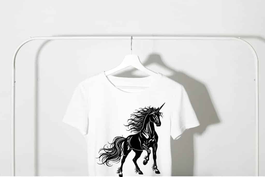 Unicorn svg with flowing mane silhouette, intricate vector design for Cricut and digital crafts, free unicorn svg for personal and commercial use.
